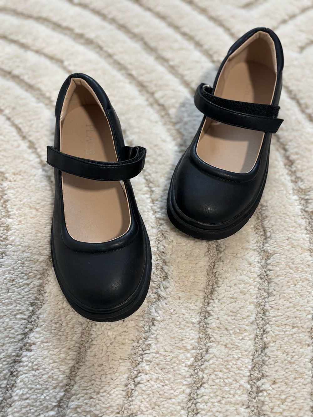 Adorable and comfortable black Mary Jane Dress Shows from The Children’s Place
